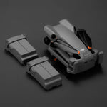 Grey Mini 5 Pro drone with two batteries on a dark background