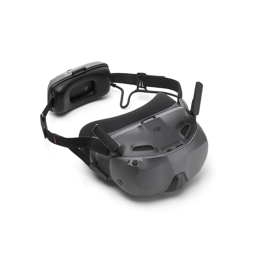 Black DJI FPV goggles shown at 45-degree front right view on a white background