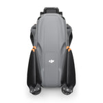 Folded DJI Air 3S drone birds-eye angle product shot on white background