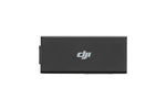 Black rectangular usb cellular dongle with DJI logo birds-eye view on a white background