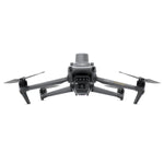 Grey drone with multiple rotors on a white background