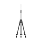 A black surveying tripod with a vertical adjustable pole on a white background