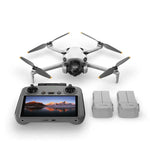 Mini 4 Pro drone with RC 2 remote controller and multiple batteries shown at front view on a white background