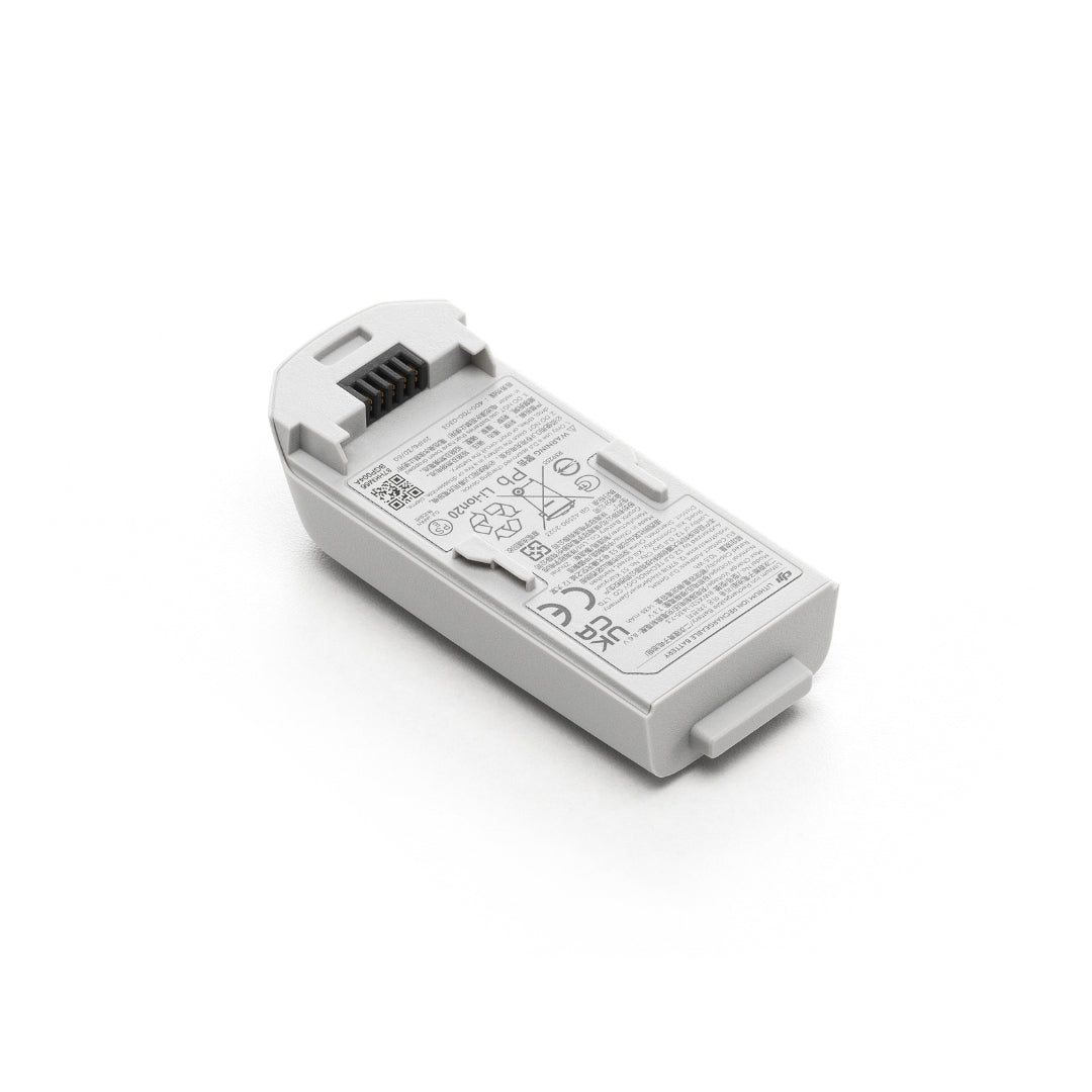 DJI Neo white battery shown at 45-degree rear left view on a white background
