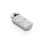 DJI Neo white battery shown at 45-degree rear left view on a white background