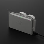 DJI Neo battery charging hub 45-degree rear right view on dark background
