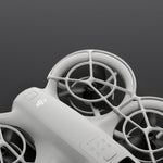 A frame showing propeller guard attached to DJI Neo drone on a dark background