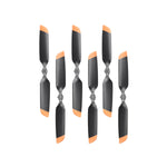 Set of six black and orange propellers on a white background