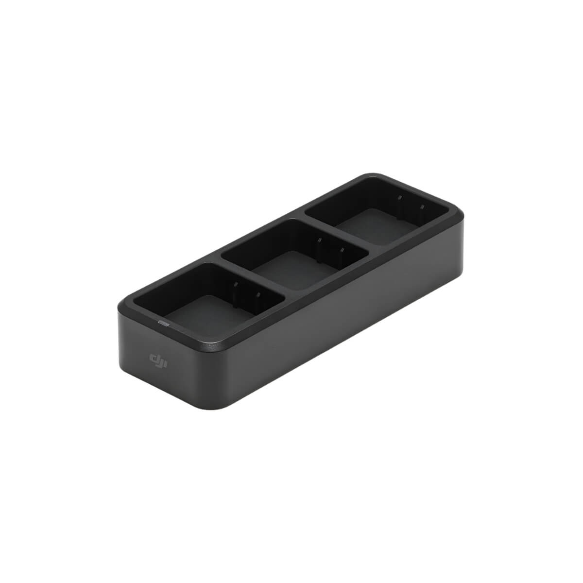 Black rectangular device with three charging compartments on a white background