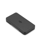 Black rectangular storage case with a DJI logo on a white background