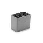 Grey battery holder with DJI logo on a white background
