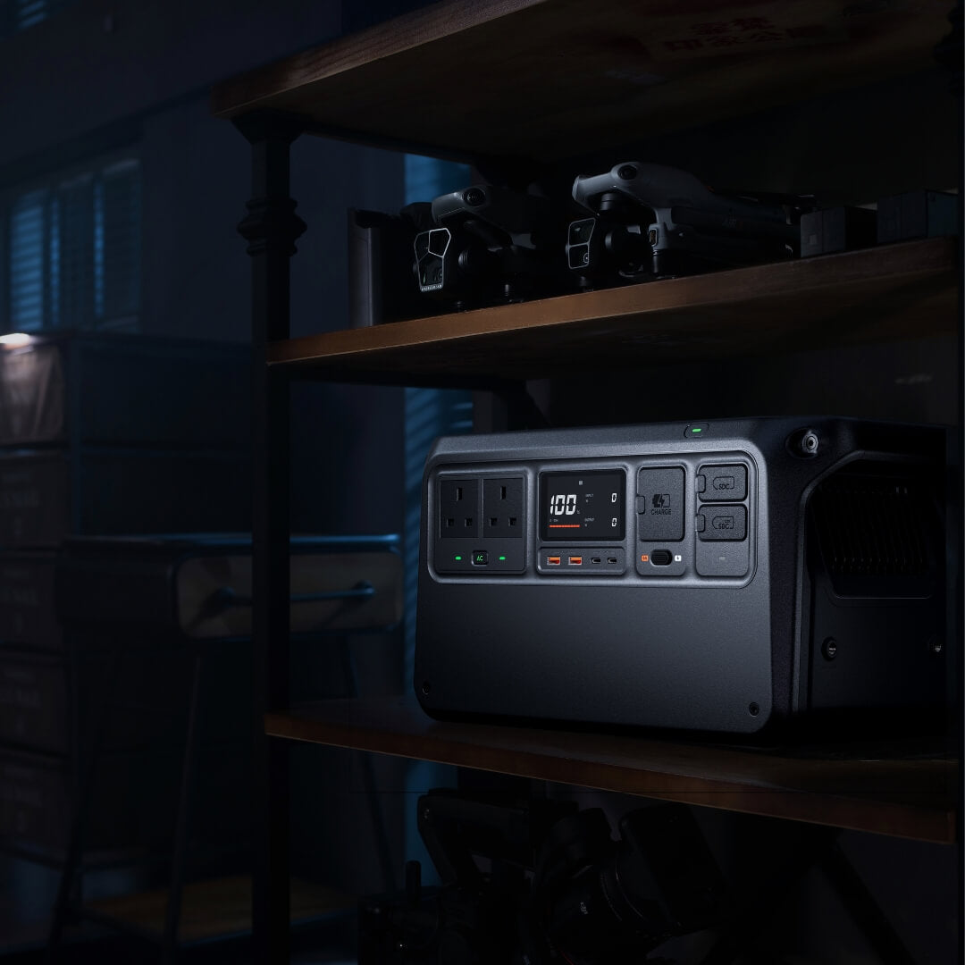 Portable Power 1000 V2 station on a wooden shelf in a dimly lit room
