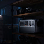 Portable Power 1000 V2 station on a wooden shelf in a dimly lit room