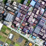 Aerial view of a residential area with houses and green spaces created by 3D render