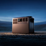 Portable Power 2000 station on a mountainous landscape at night