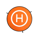 Orange circle with a white 'H' in the center on a white background