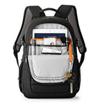 Black backpack with tablet and stationary on a white background
