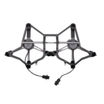 Black drone frame shown at front view on a white background