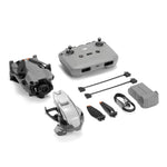 Mini 5 Pro drone with battery, propellors, controller and cables from front right angle on a white background