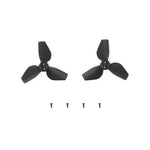 Two black Neo propellers with screws shown at a front view on a white background