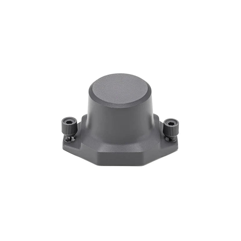 Black DJI RTK module shown at rear view on a white background