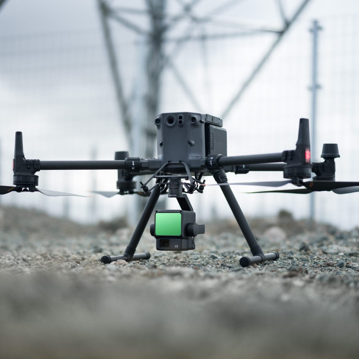 DJI Zenmuse L2 payload on Matrice enterprise drone on the ground with cloudy background
