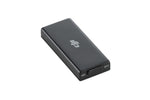 DJI black USB cellular dongle top-down right 45-degree view on white background