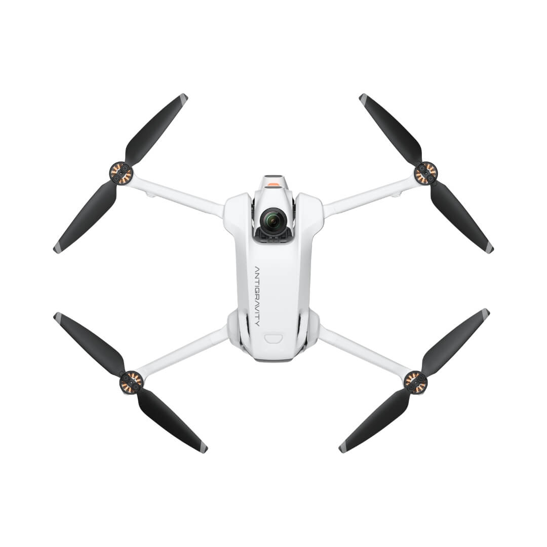 White drone with black propellers birds eye view on a white background