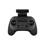 Black remote controller with joystick and buttons on a white background