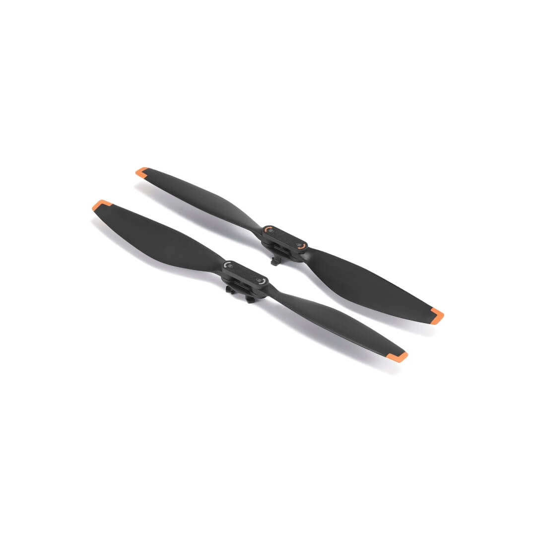 Two black propellers with orange accents on a white background