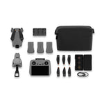 Drone, 3 batteries, remote controller, storage bag and accessories on a white background from birds eye view