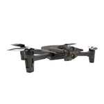Black drone with unfolded wings on a white background